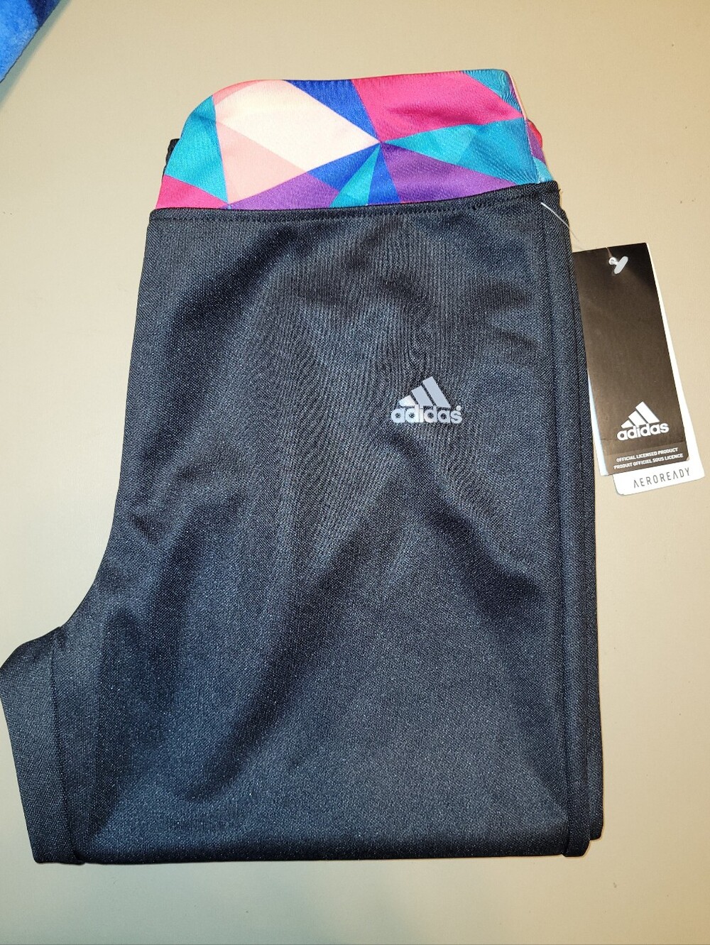NWT - adidas Aeroready Black Capris with Multicolor Geometric Waistband. Size L.